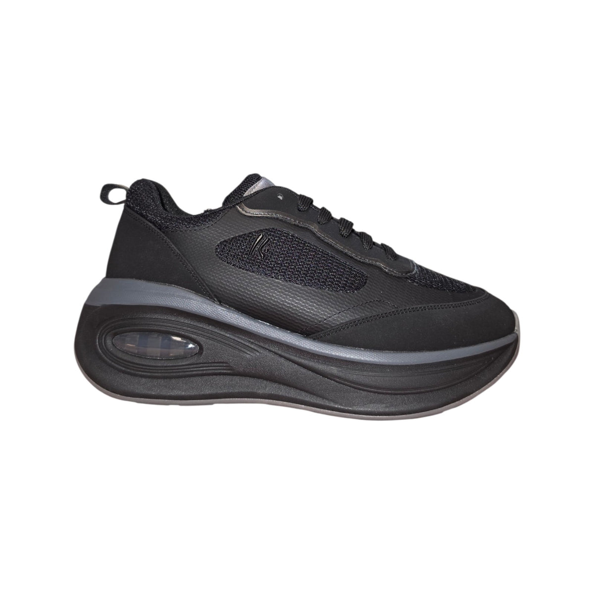 Keys sneaker nera con suola alta sagomata